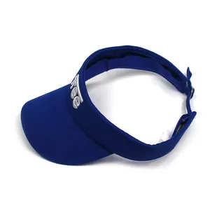 Detailed close-up of blue cotton sun visor with white 'Free' embroidery and adjustable strap