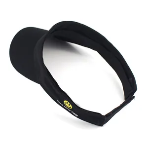 Detail of embroidered yellow smiley face and white YOU MATTER text on black visor hat
