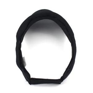 Detail view of the black sun visor hat featuring adjustable velcro closure and inner tag
