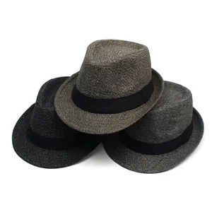 Classic men's felt trilby hats with woven texture and black ribbon band in dark tones