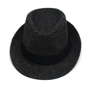 Close-up of classic dark grey tweed fedora hat with a black decorative band detail