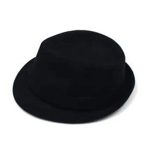 Close-up of classic black trilby hat featuring a stylish brim and decorative ribbon band
