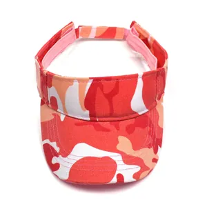 Detail view of pink camouflage sun visor featuring adjustable strap and sturdy cotton fabric