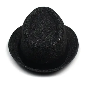 Top view of men's black woven fedora hat with short brim and fabric decorative band