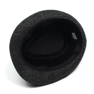 Overhead view of a men's stylish fedora hat with textured weave and interior sweatband