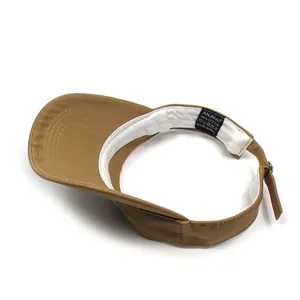 Visière de soleil marron en coton avec sangle réglable et détail de bande interne