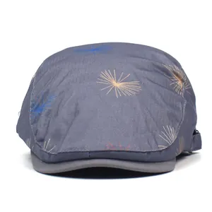 Detailed view of dandelion print on dark grey cotton twill ivy cap with retro design