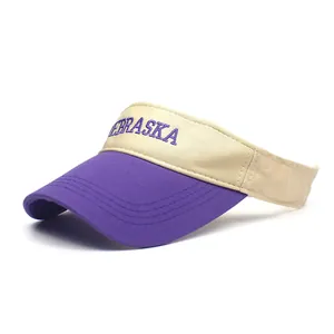Detailed view of the purple and beige cotton sun visor with Nebraska letter embroidery