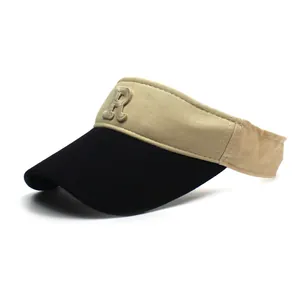 Detail of cotton baseball cap featuring contrast colors and embroidered letter R logo