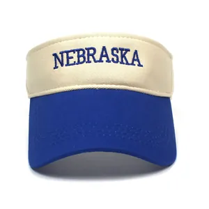 Close-up of contrast stitching and Nebraska embroidery on a cotton sun visor hat
