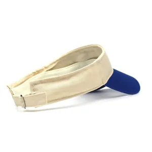Detail view of cotton sun visor showing adjustable metal buckle and blue contrast brim