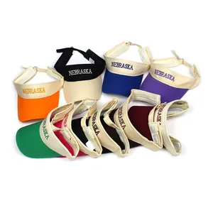 Multiple colors of cotton sun visor hats with Nebraska embroidery and adjustable strap
