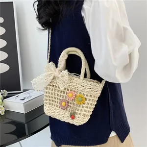 Fashionable lace straw woven handbag for women with floral ribbon and long strap