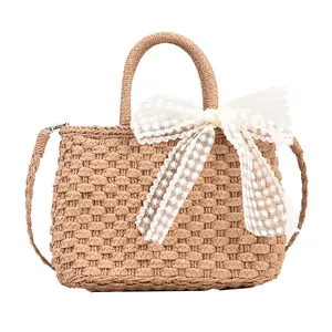 Sac à main en paille avec grand nœud en dentelle blanche et bandoulière amovible