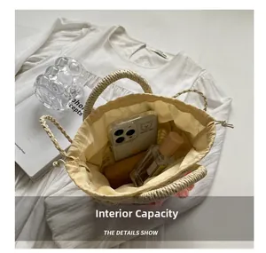 Top view of straw bucket bag with drawstring liner showing spacious internal capacity