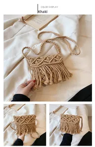Detail of khaki woven straw bag with tassels and braided shoulder strap for beach