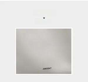 Detailed close-up of light gray pebbled leather texture with embossed brand logo