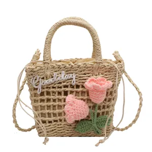 Handmade woven straw bag with crochet flowers and drawstring lining for summer beach