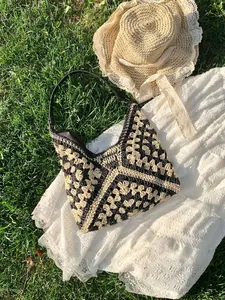 Large crochet straw tote bag with black and white geometric patterns for summer