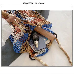 Detail view of woven beach bag showing high capacity for tablets and cosmetics