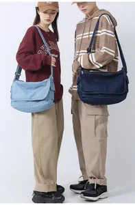 Detailed comparison of light and dark blue large capacity denim messenger bags