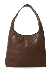 Minimalist dark brown quilted tote bag with large diamond stitching and a wide shoulder strap