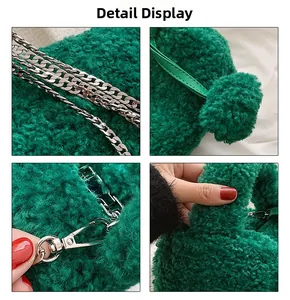 Detail view of green faux fur texture with silver metal chain and zipper closure
