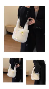 Detail view of white plush bucket bag with colorful ribbon bows and soft faux fur texture