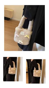 Detail of faux lambswool bucket bag with colorful bows and a decorative lace patch