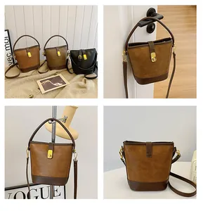 Detailansicht der Vintage-Beuteltaschen in Braun und Schwarz mit mattem PU-Leder