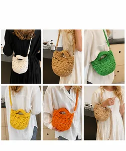 Detail showing various colors of hollow woven bucket bags with textured shoulder straps