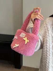 Pink plush lamb wool bucket bag for women with decorative bows and lace detail