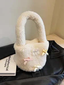 Chic cream white faux shearling bucket bag with colorful bows and lace patch detail