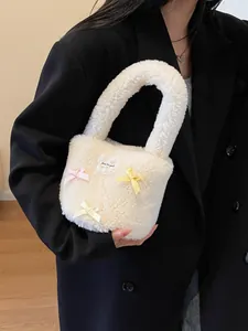 White lamb-fleece bucket bag with bow decorations and top handle for women's winter style