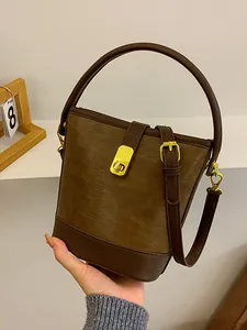 Vintage-Beuteltasche mit Kontrastfarben, Rundgriff und Goldverschluss für Damen