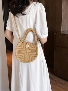 Sac à main rond en paille tissée naturelle pour les vacances d'été avec bandoulière
