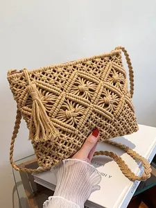 Bohemian hand-woven crossbody beach bag with geometric patterns and fringe tassels
