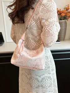 Pink jacquard hobo bag with traditional Chinese scenery embroidery and elegant tassel