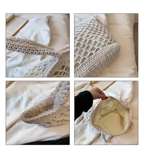 Détail du sac de plage beige au crochet montrant le tissage creux et le zip en métal
