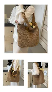 Detail of hand-woven straw tote bag showing thick texture and spacious interior