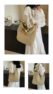Macro detail of beige woven straw tote bag with wide textile shoulder strap in cafe setting