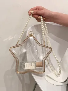 Sac à main étoile en acrylique transparent avec bordure dorée et chaîne en perles