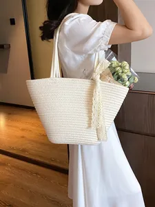 Large white woven straw tote bag with lace ribbon for summer beach vacations