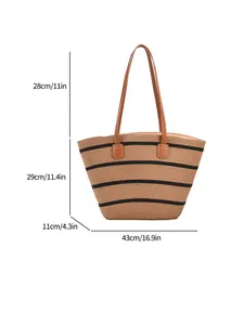 Large capacity straw beach tote bag with black stripes and brown leather handles