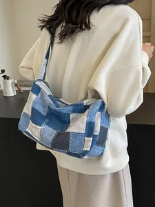 Patchwork denim shoulder bag in blue tones with retro bohemian style for women