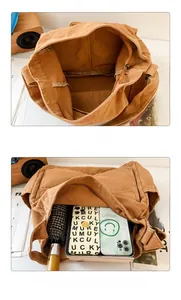 Detailed interior of large canvas messenger bag showing pockets for iPad and A4 magazines