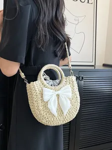 Sac en paille de style pastoral avec nœud en mousseline et doublure à pois