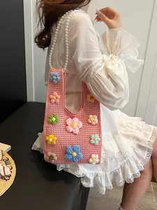 Bolso tipo cubo de punto rosa con flores 3D de ganchillo y asa de cuentas de perlas