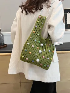 Handgefertigte grüne Strickhandtasche mit bunten Perlen und Perlenriemen für Damen