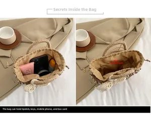 Macro view showing the spacious interior of a woven straw bucket bag with floral accents